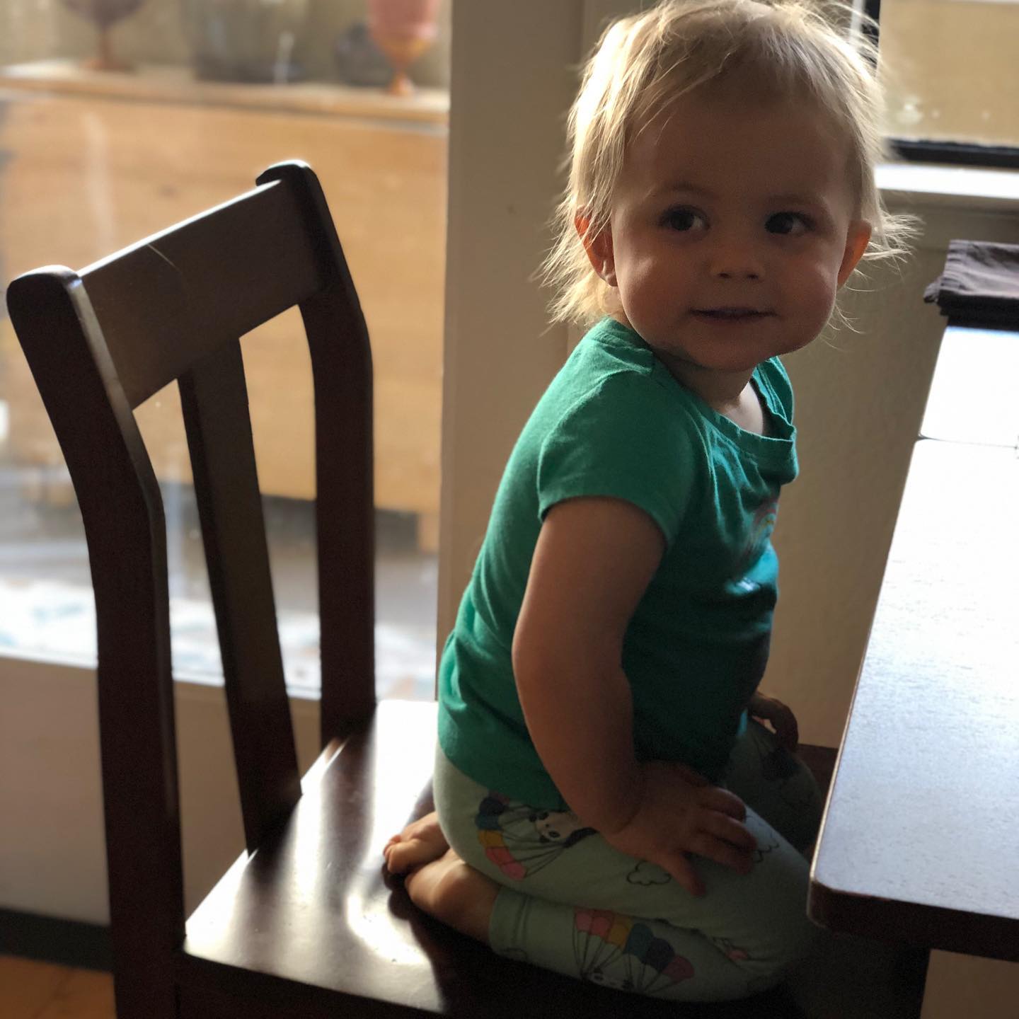 And she now climbs onto big person chairs. “Don’t stop me now...!”