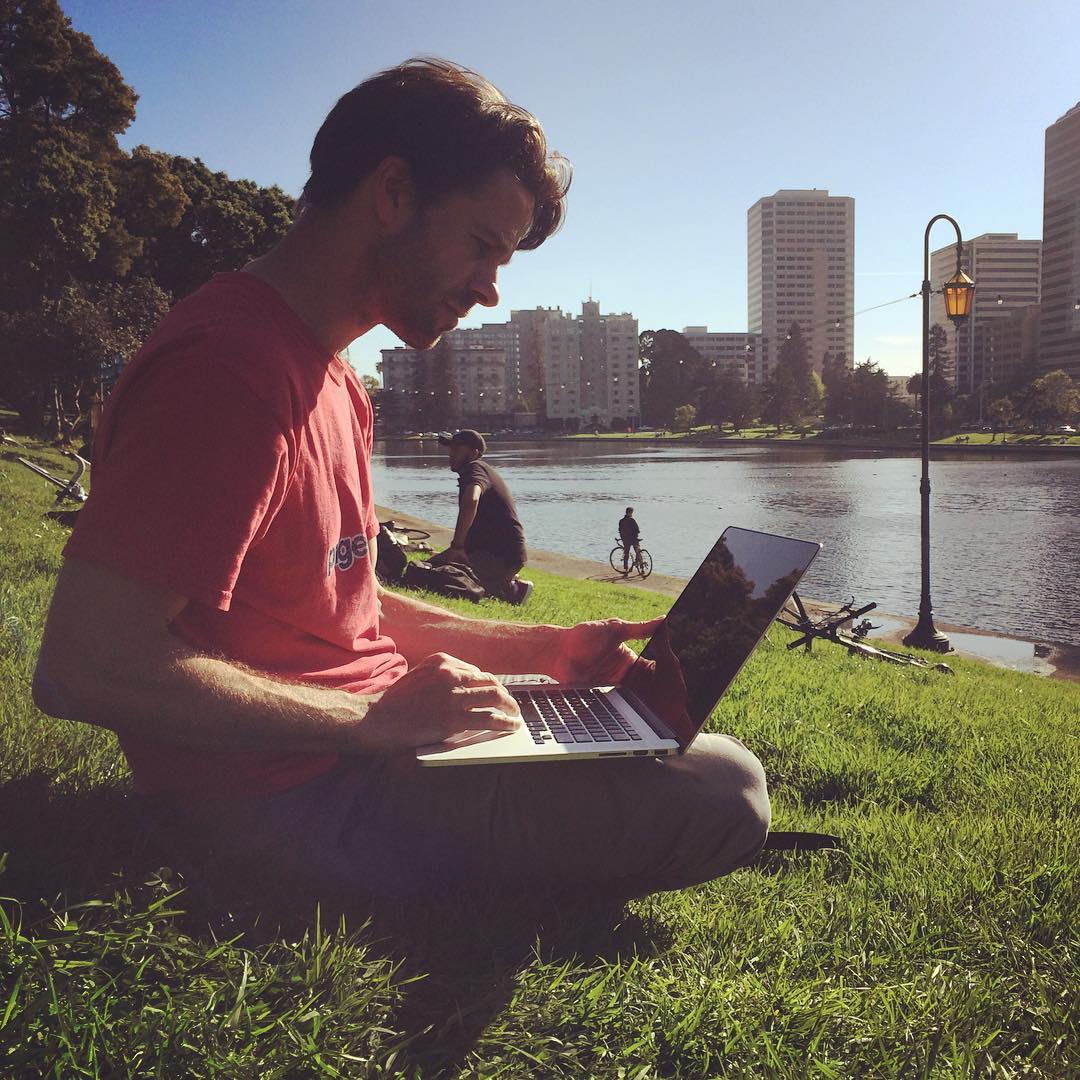 Caleb uploading his latest video lakeside