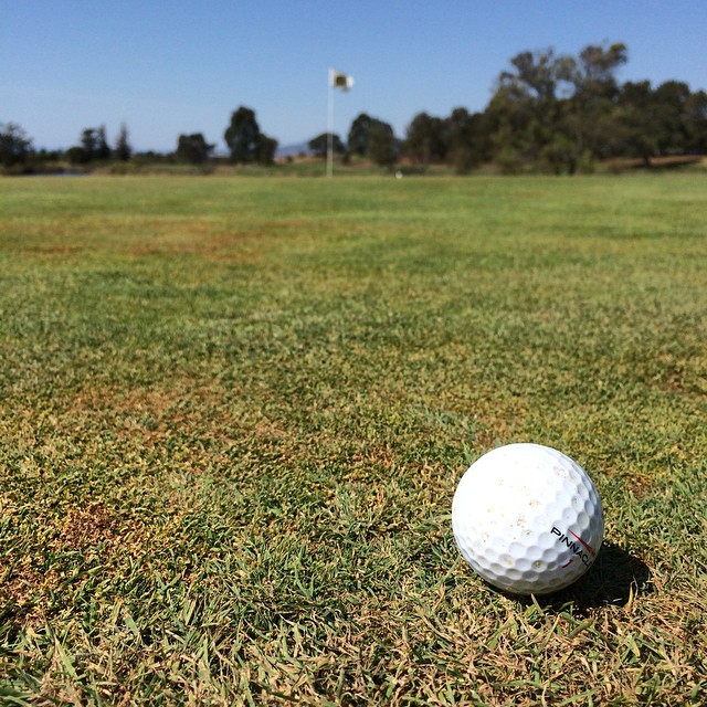 Kennedy golf with uncle Jim. Can always stand a good dose of humility. :)