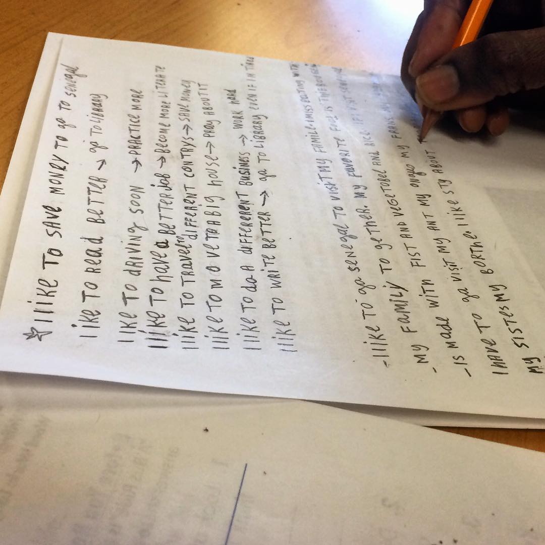 Mame practicing writing about her dreams and what she is doing to accomplish them.